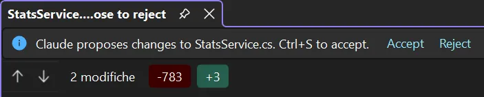 The editable diff: the bar that asks to accept or reject, and the change counts